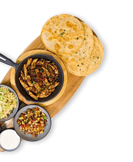 Tacos and appetizers on a modern serving plate